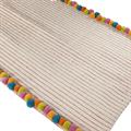 Tappeto beige con pon-pon 120x180
