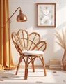 Poltrona a petalo in rattan con cuscino 77x64H91